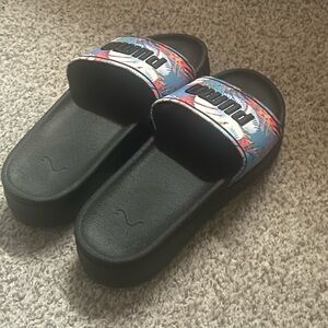 Puma Woman’s Black Slip-On Sandals